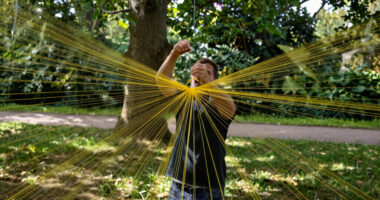 jesús rafael soto suspends 4,000 yellow strands in kensington gardens for serpentine