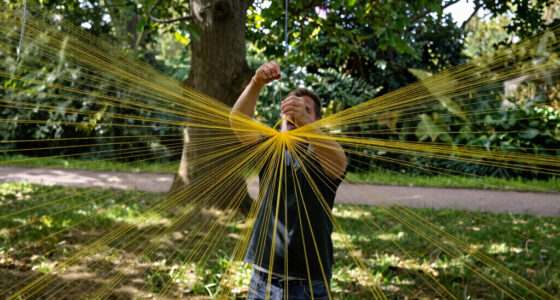 jesús rafael soto suspends 4,000 yellow strands in kensington gardens for serpentine